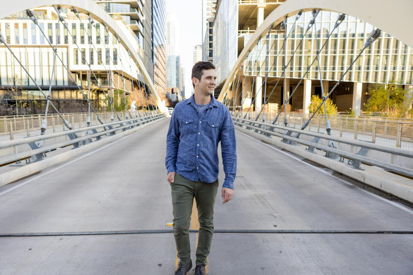 John Vishnesky standing on a bridge in Austin